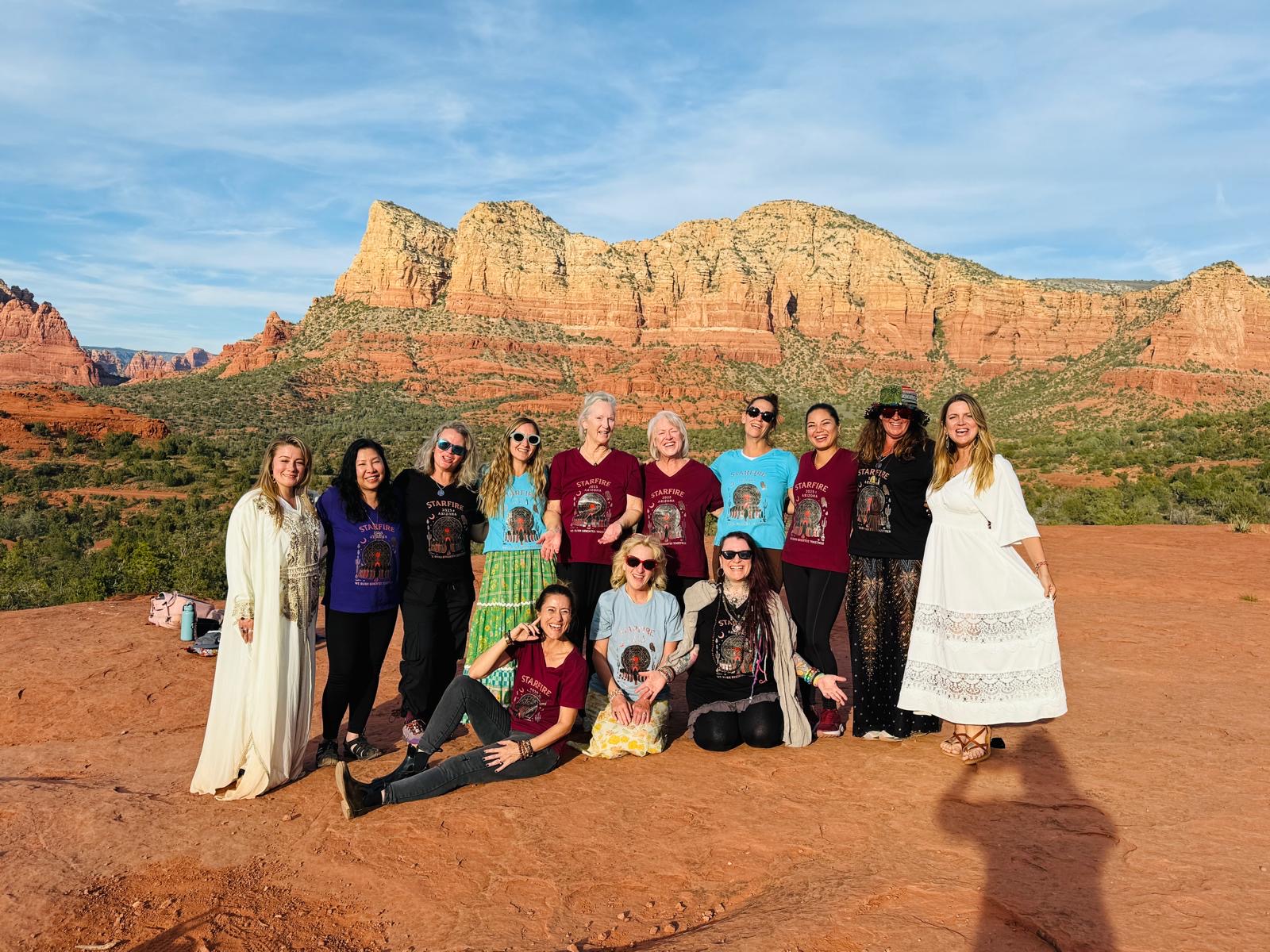 A beautifully set dining table outdoors, surrounded by greenery, with healthy, colorful dishes and women sharing a meal, laughter, and conversation, evoking a sense of nourishment and togetherness.