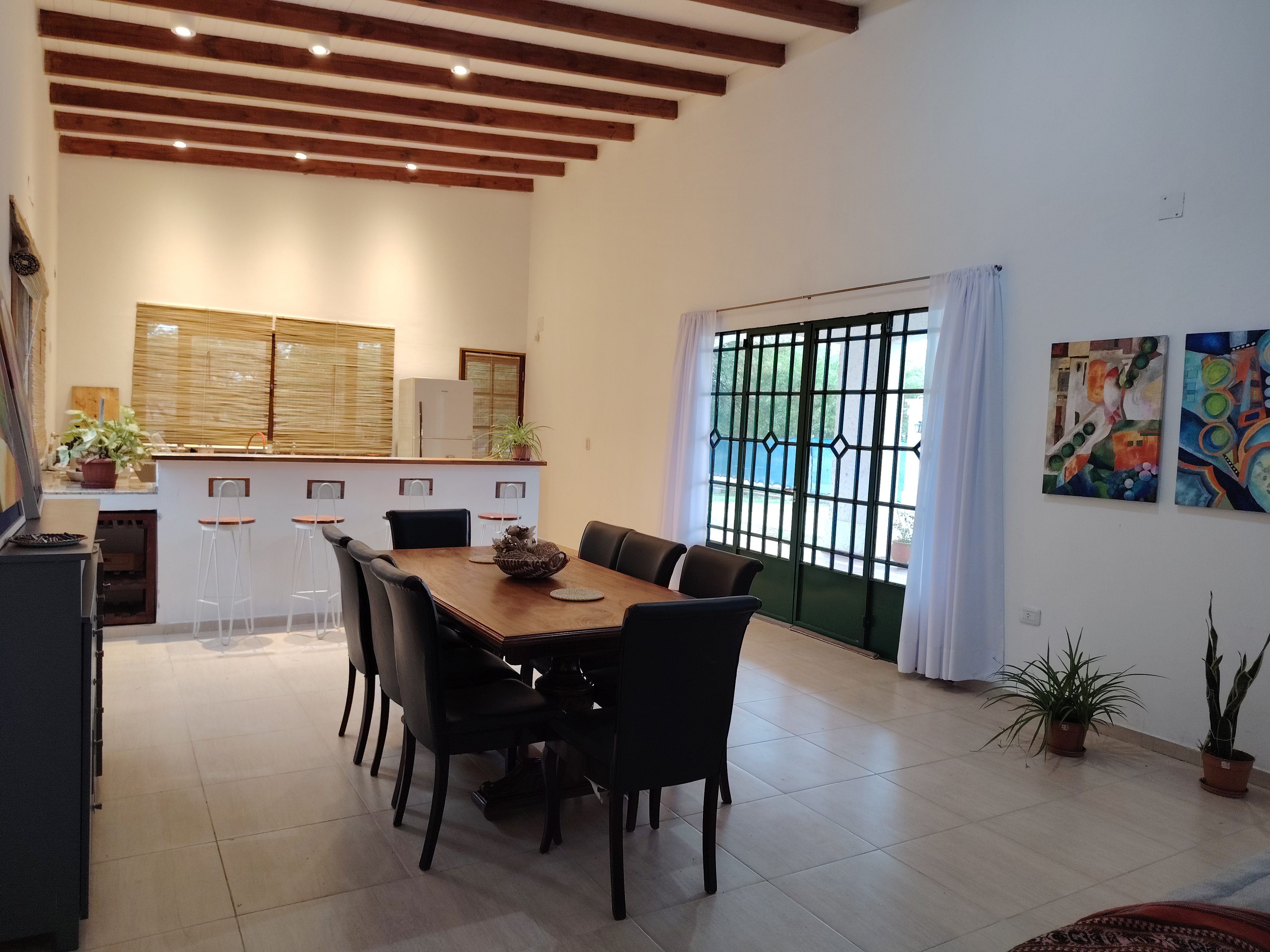 a modern house with a walkway leading to the front door