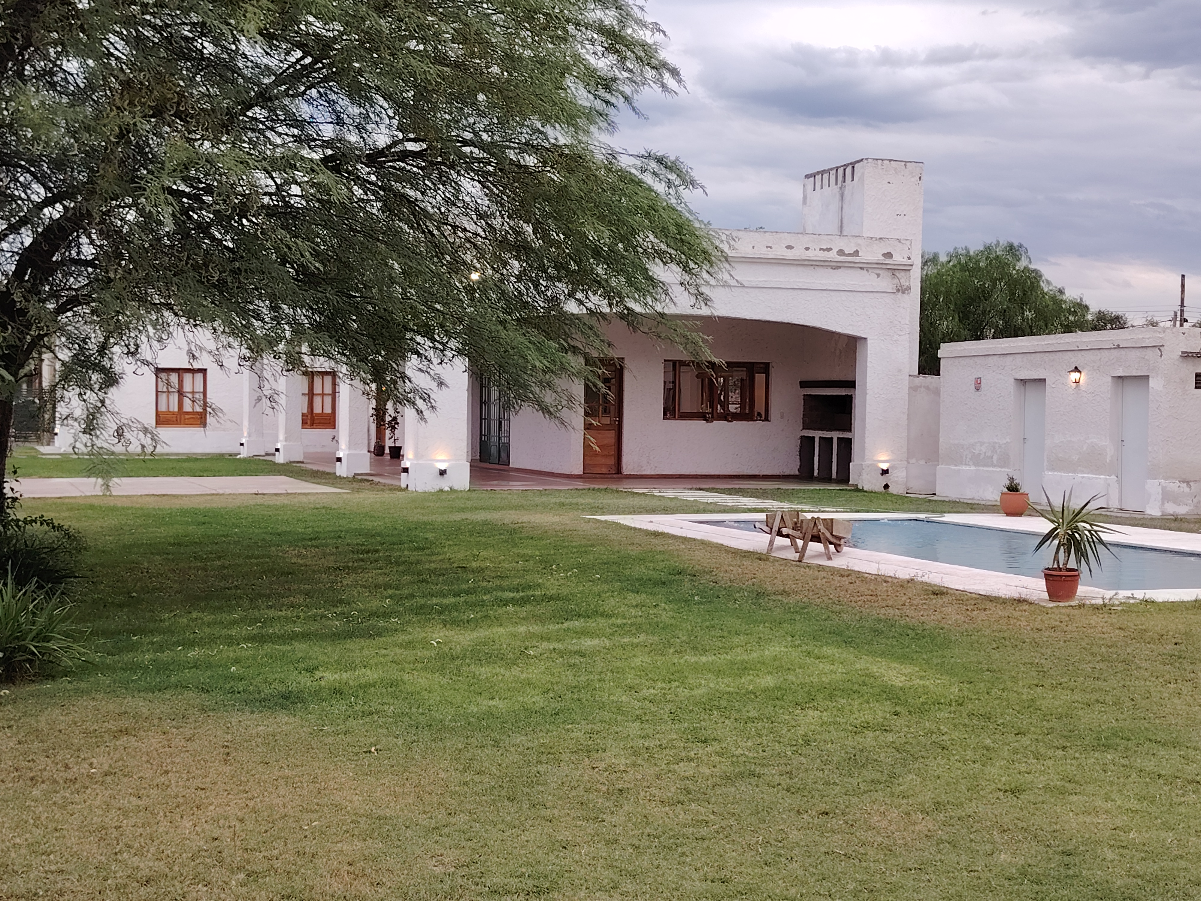 a modern house with a large front yard
