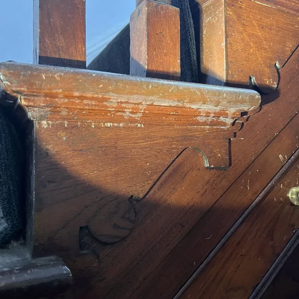 Dust and mould residue visible on wooden staircase during detailed inspection
