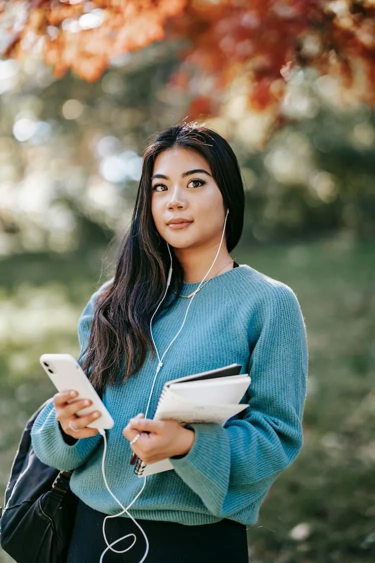 Successful Female high school student studying online