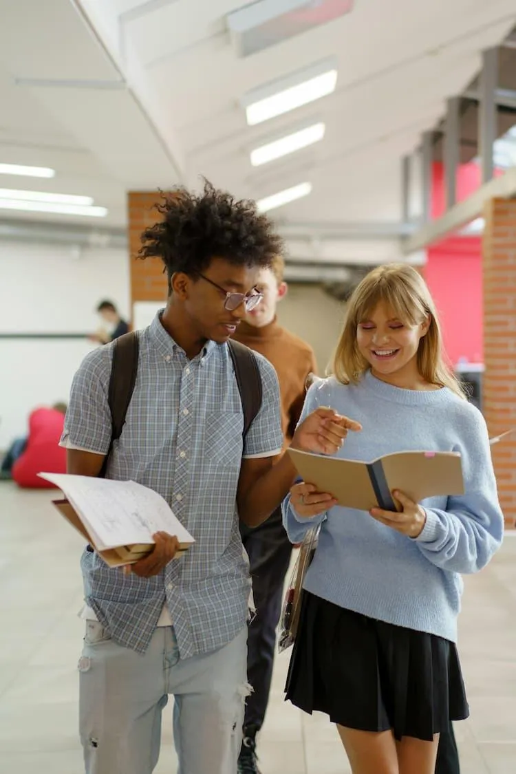 Refugee student receives coaching from a bilingual success coach