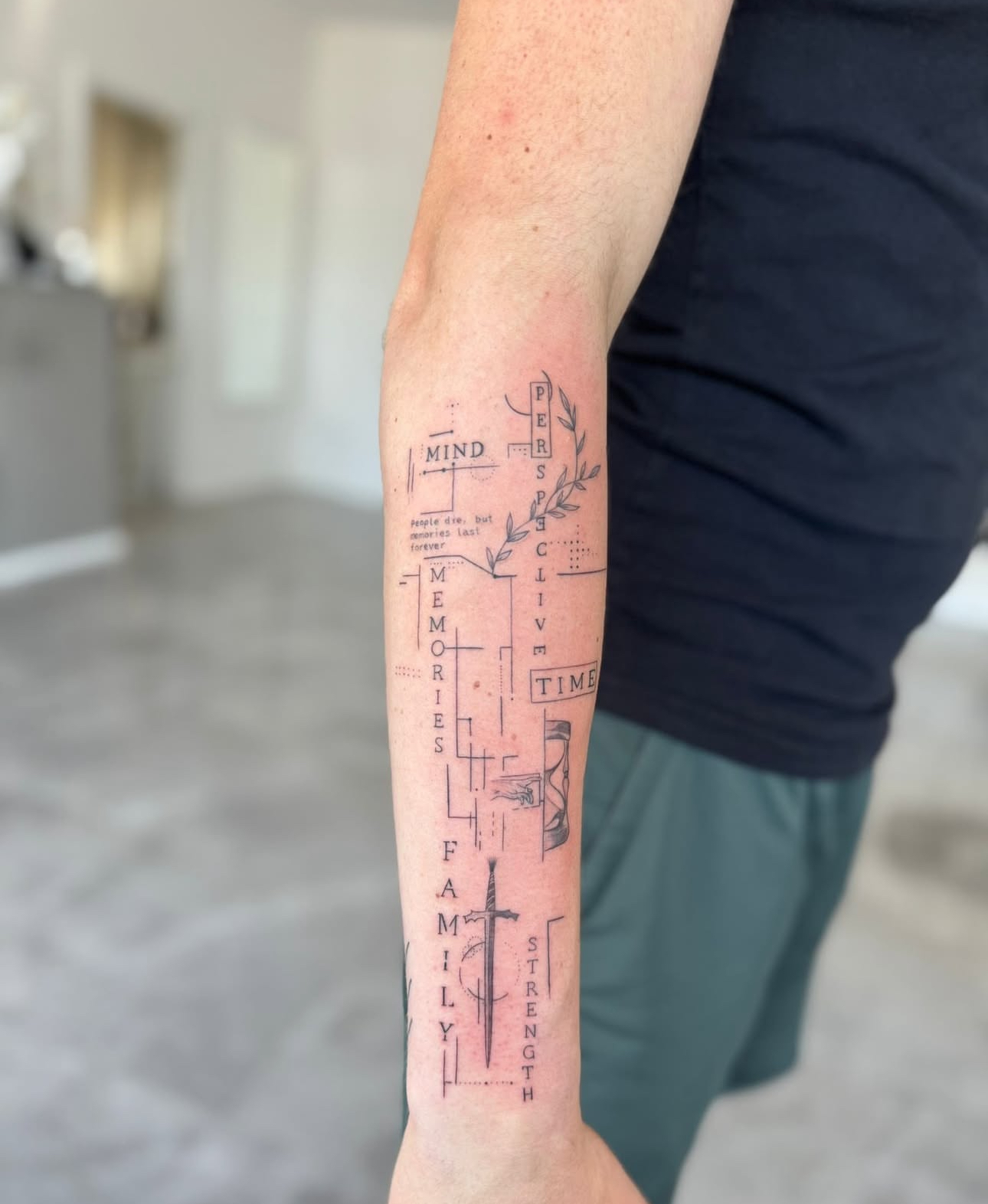 person with tattoo on right arm