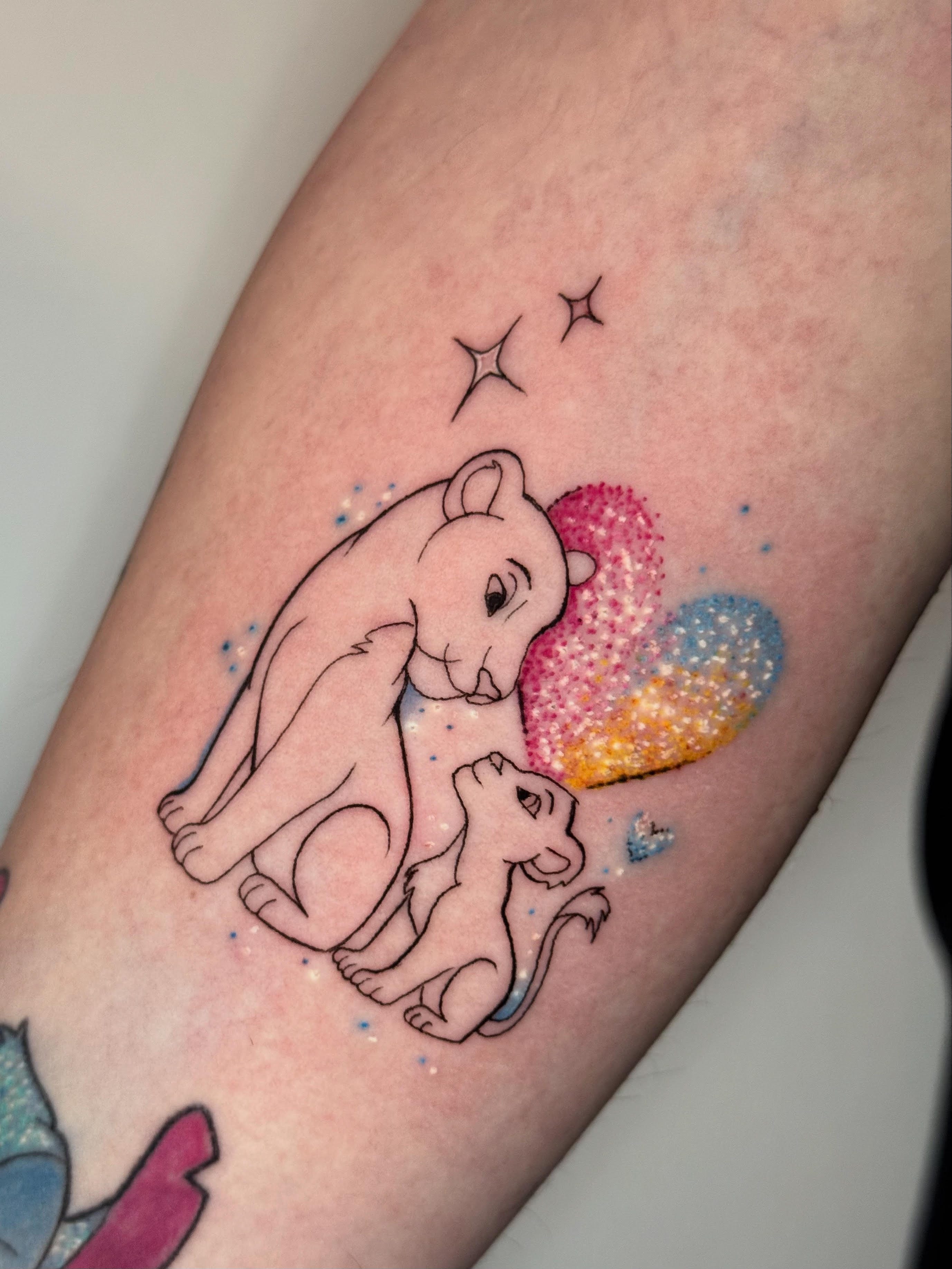 person in blue denim shorts and white nike sneakers standing on gray concrete floor