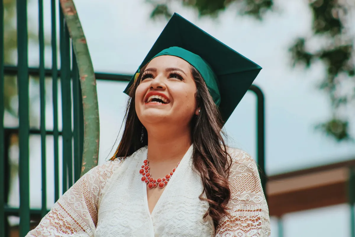 woman walks towards college