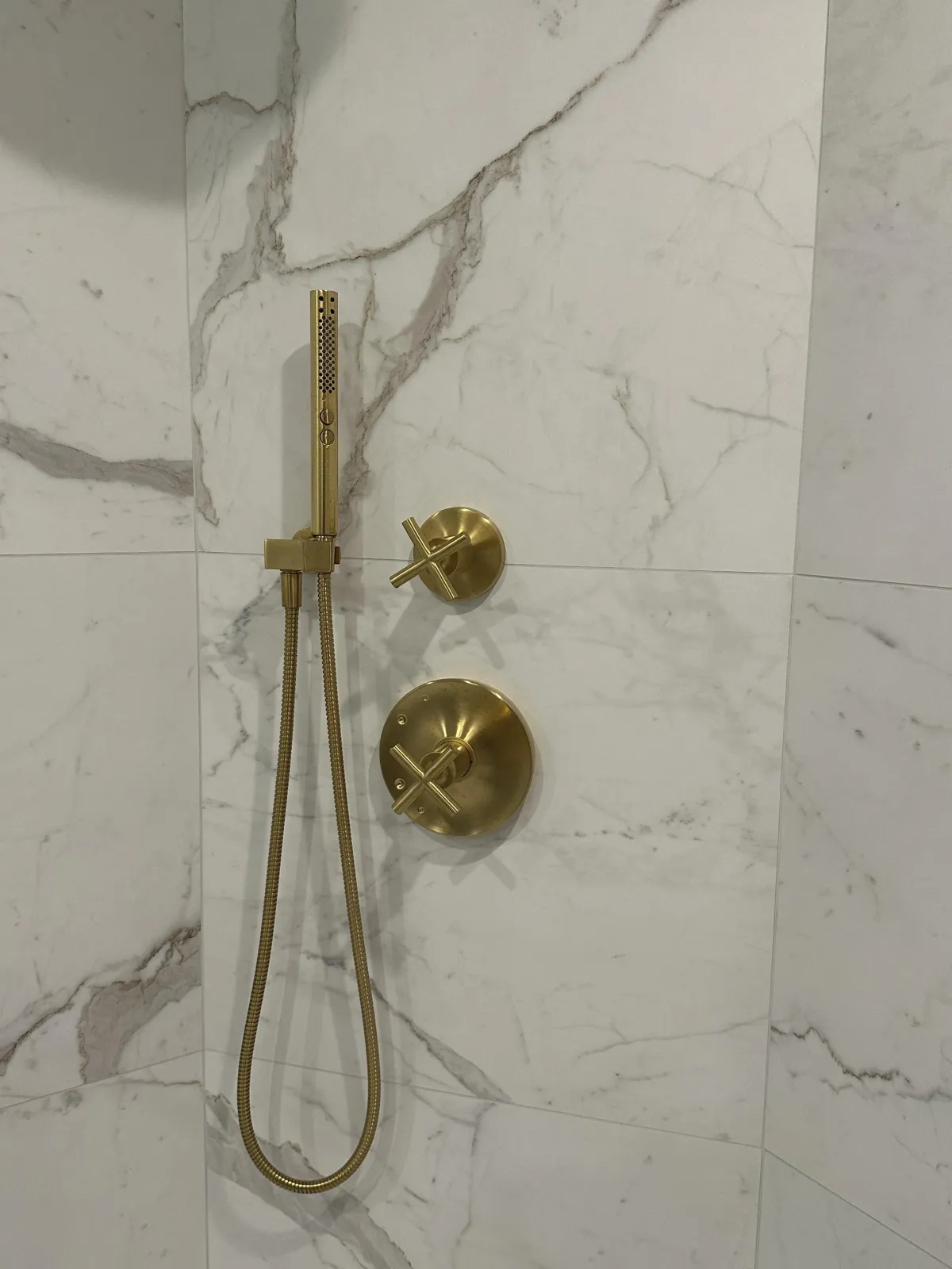 Elegant tiled shower with glass door in Bellevue