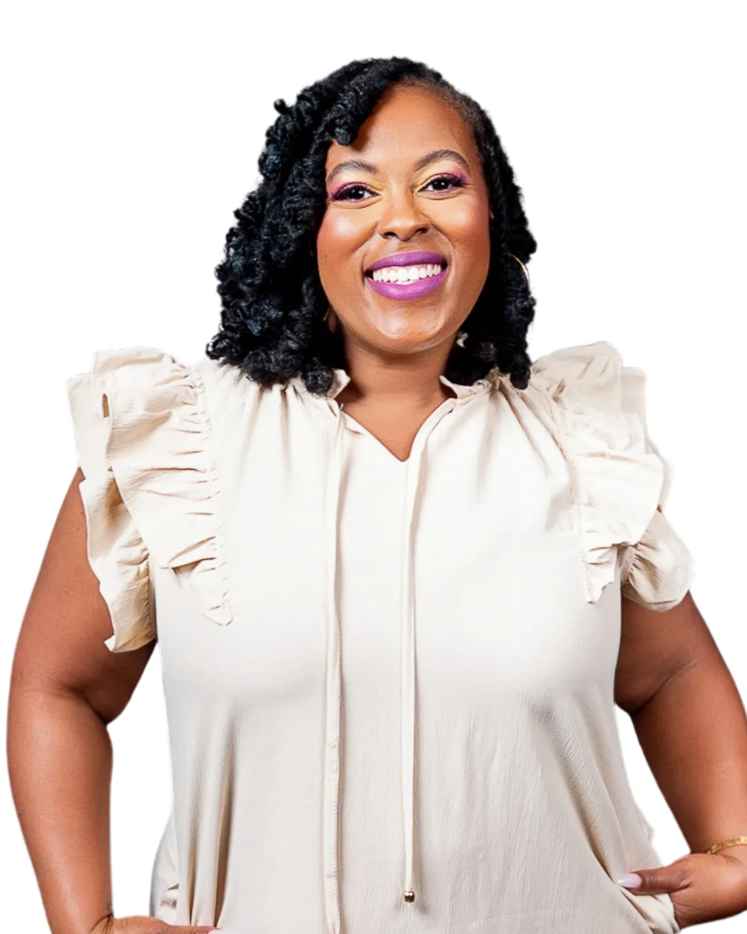 Dr. Courtney Pate, PhD, PMHNP-BC, founder of Restored Radiance Integrative Psychiatry, smiling confidently in a cream ruffled blouse
