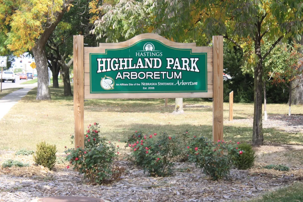 Large backyard deck with cedar pergola in Highland Park Hastings