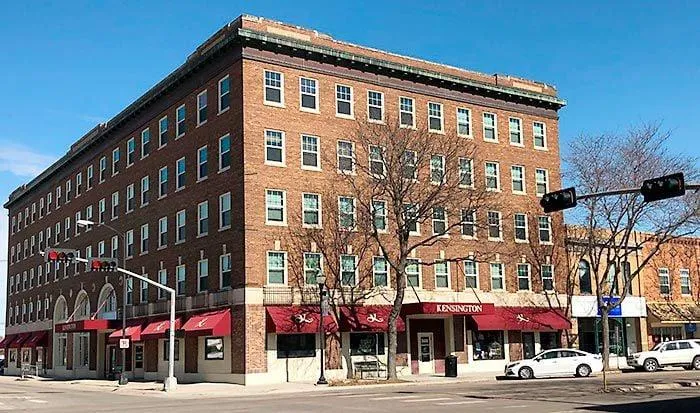 Restored porch with ADA ramp and cedar railing in Downtown Norfolk NE