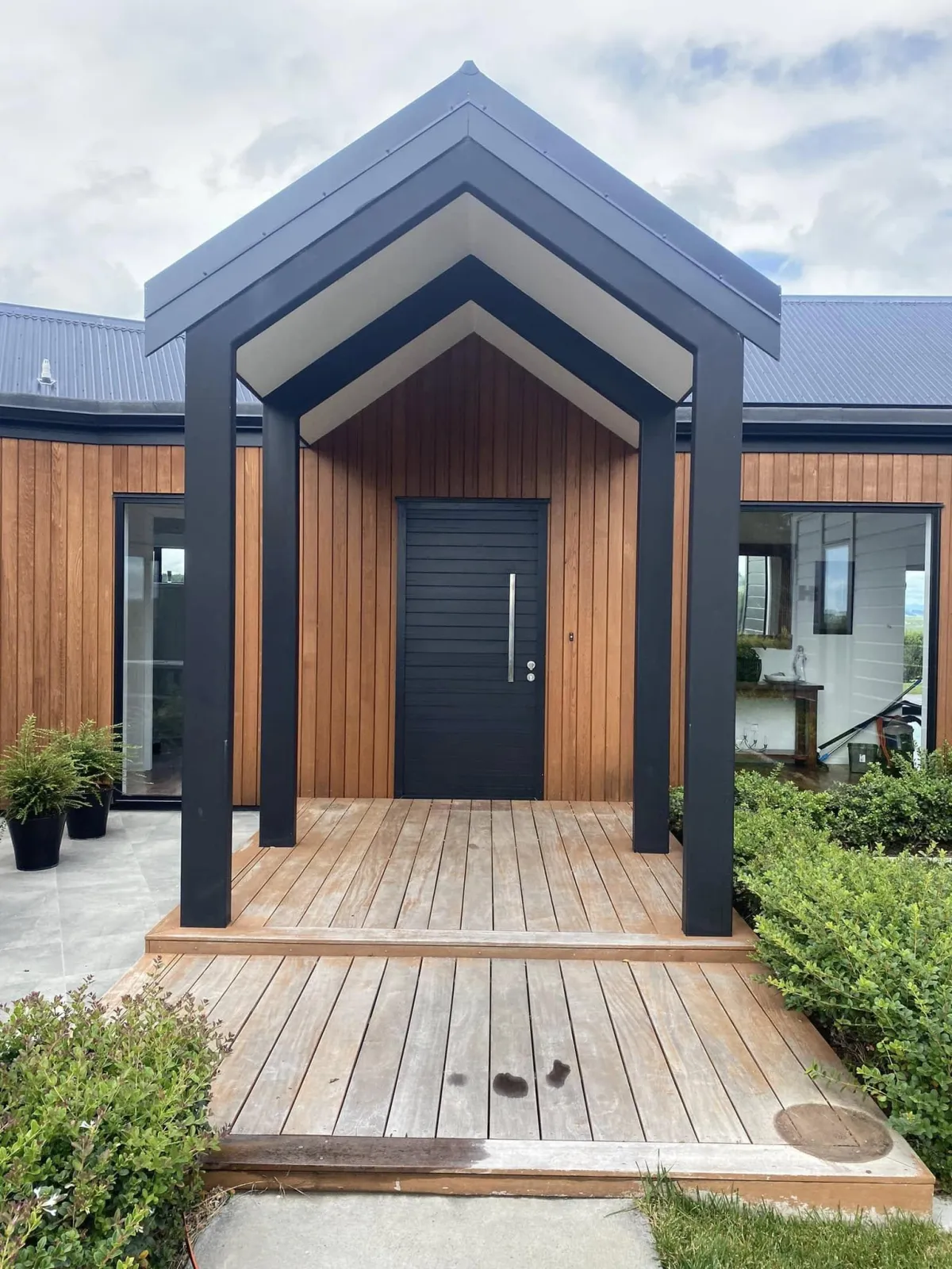 Napier home exterior painted with alloy window frame restoration