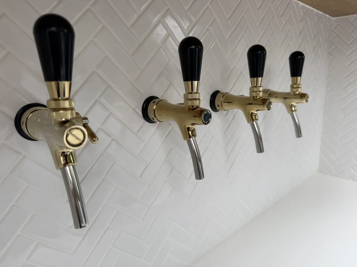 Close-up of premium draft taps used by Social Pour mobile bar rentals in Los Angeles and Orange County