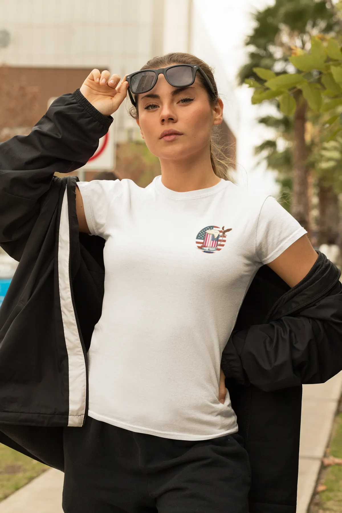 Woman raising her sunglasses up