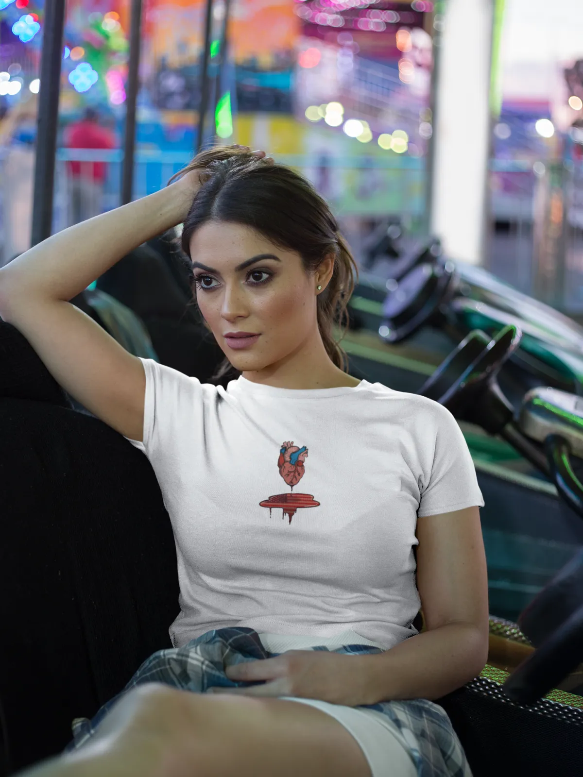 woman sitting in a bumper car