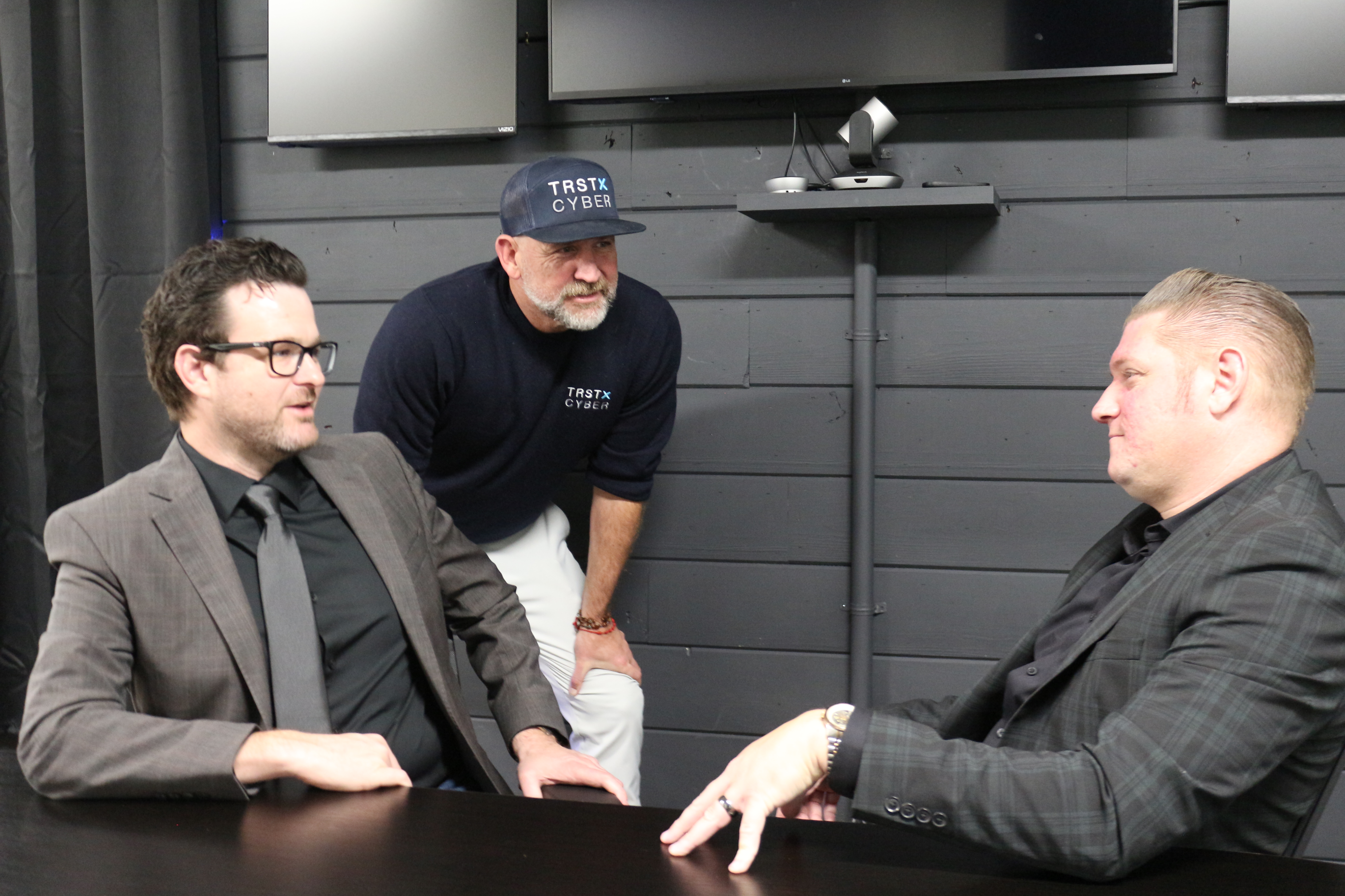 black iphone 5 beside brown framed eyeglasses and black iphone 5 c