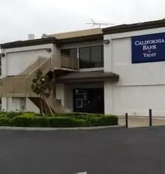 black iphone 5 beside brown framed eyeglasses and black iphone 5 c