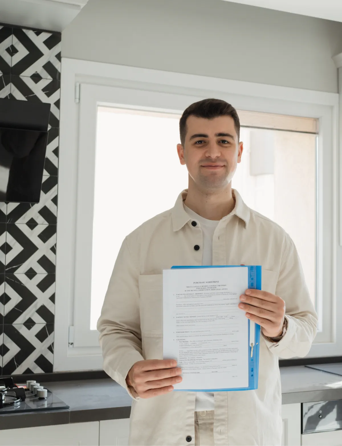 brown concrete building near green trees under blue sky during daytime