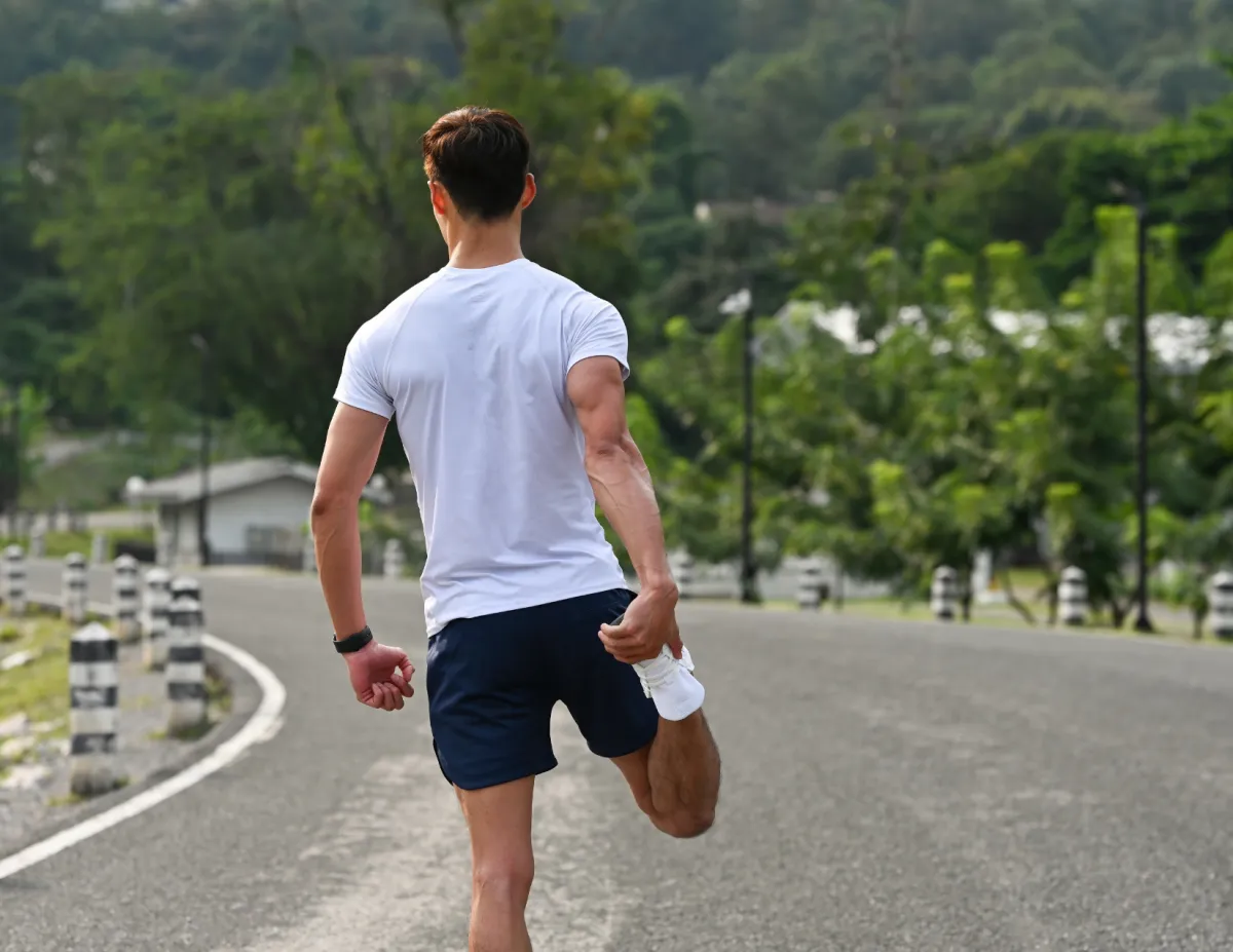 Man checking fitness progress despite consistent workouts