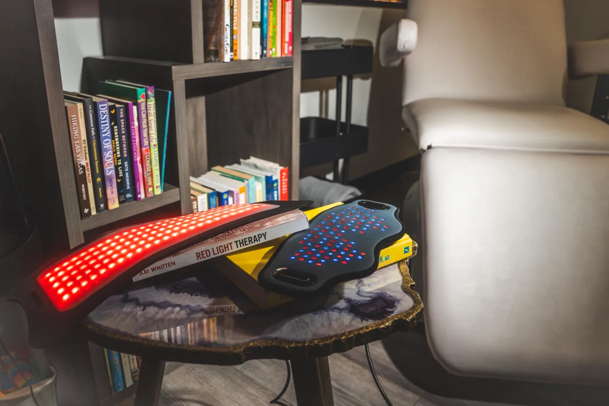 Red and infrared LED light therapy pads applied to the body for pain relief and recovery