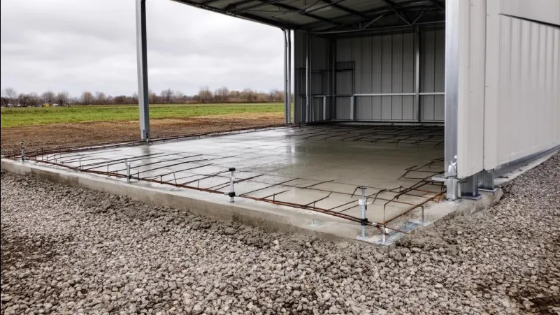 Freshly poured concrete slab inside a steel shed by an epoxy flooring service in Albury, NSW, ready for coating.
