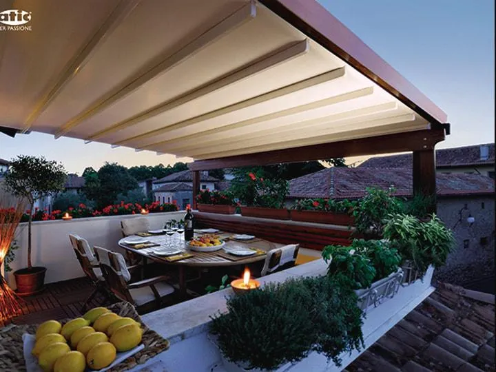 Infinity Premiere Services custom pergola installation in Northwest Ohio - modern rooftop pergola with outdoor dining area in Toledo and Perrysburg