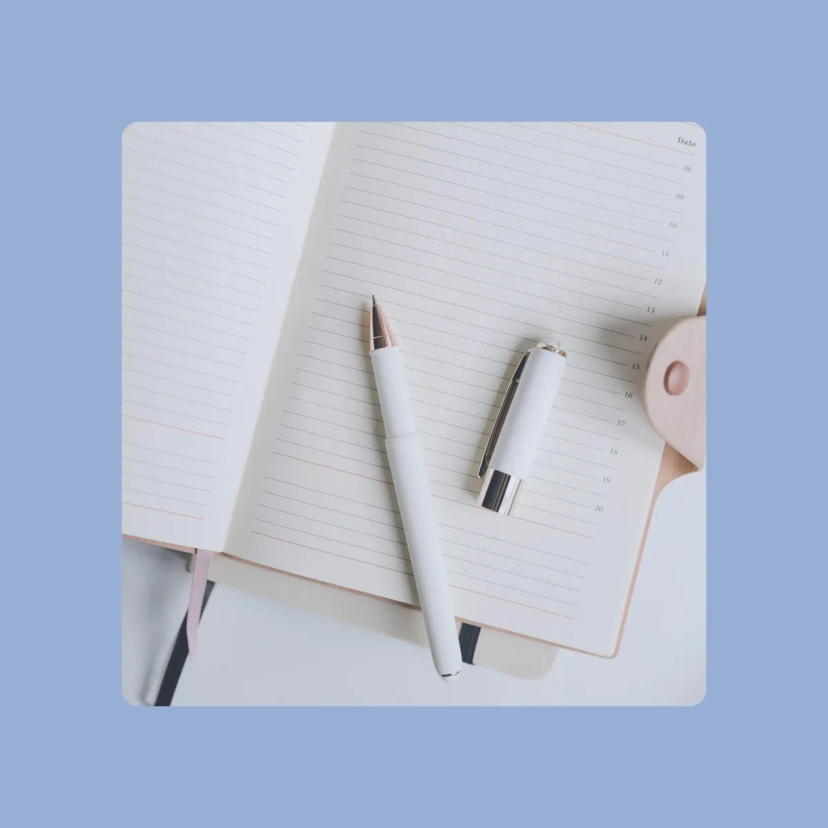 Real estate agent's notebook with cream colour pen