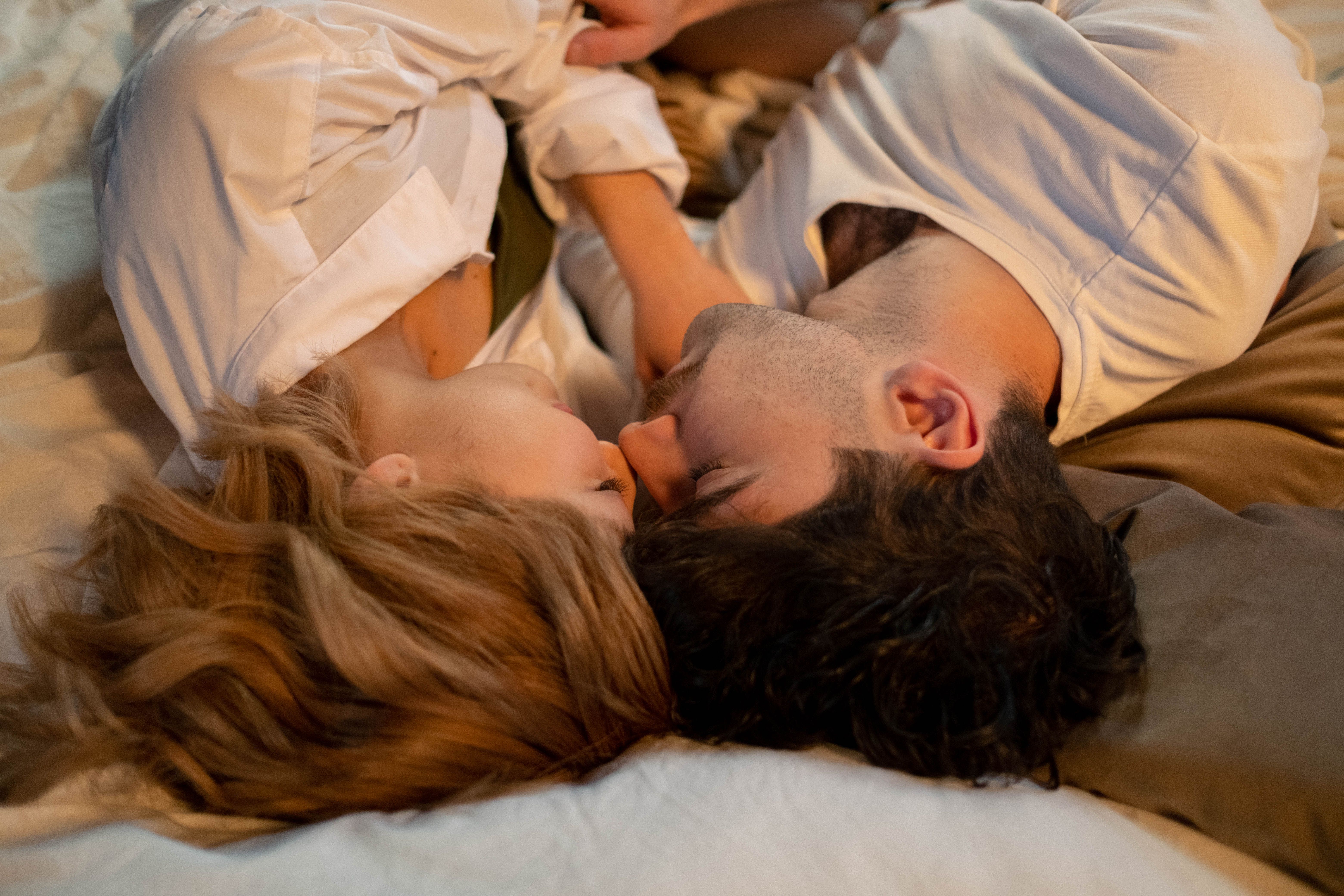 Couple sharing a close and intimate moment, representing emotional connection and healthy sexual intimacy.