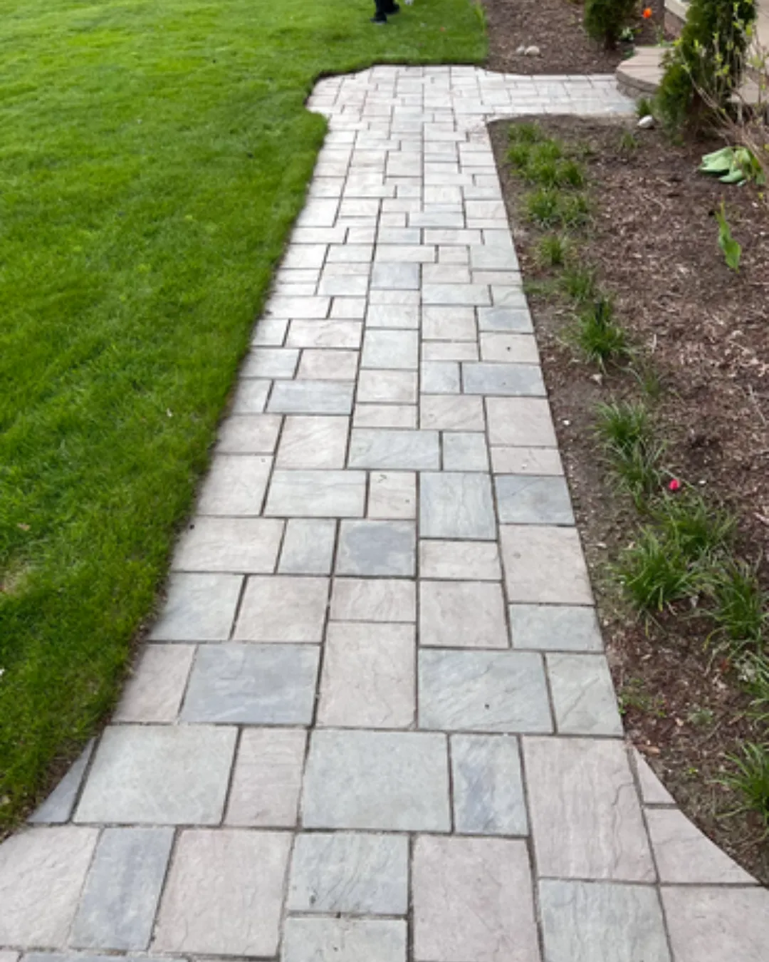Local pressure washing crew cleaning a home exterior in Sterling Heights Michigan
