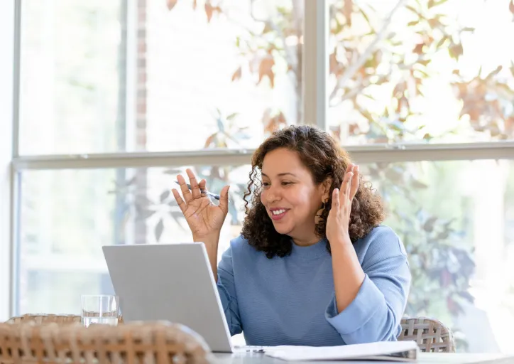 A woman giving virtual decluttering help.