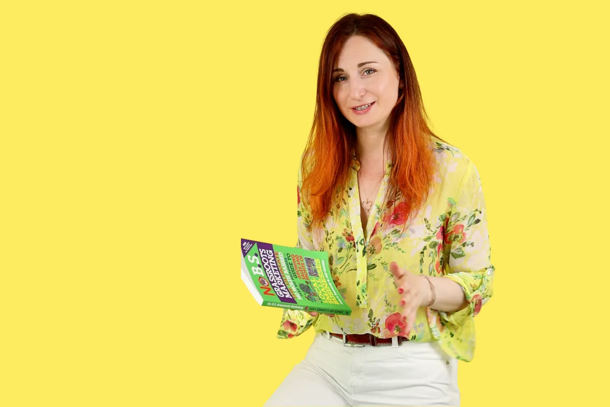 Katya Nicholas with a book in her hand