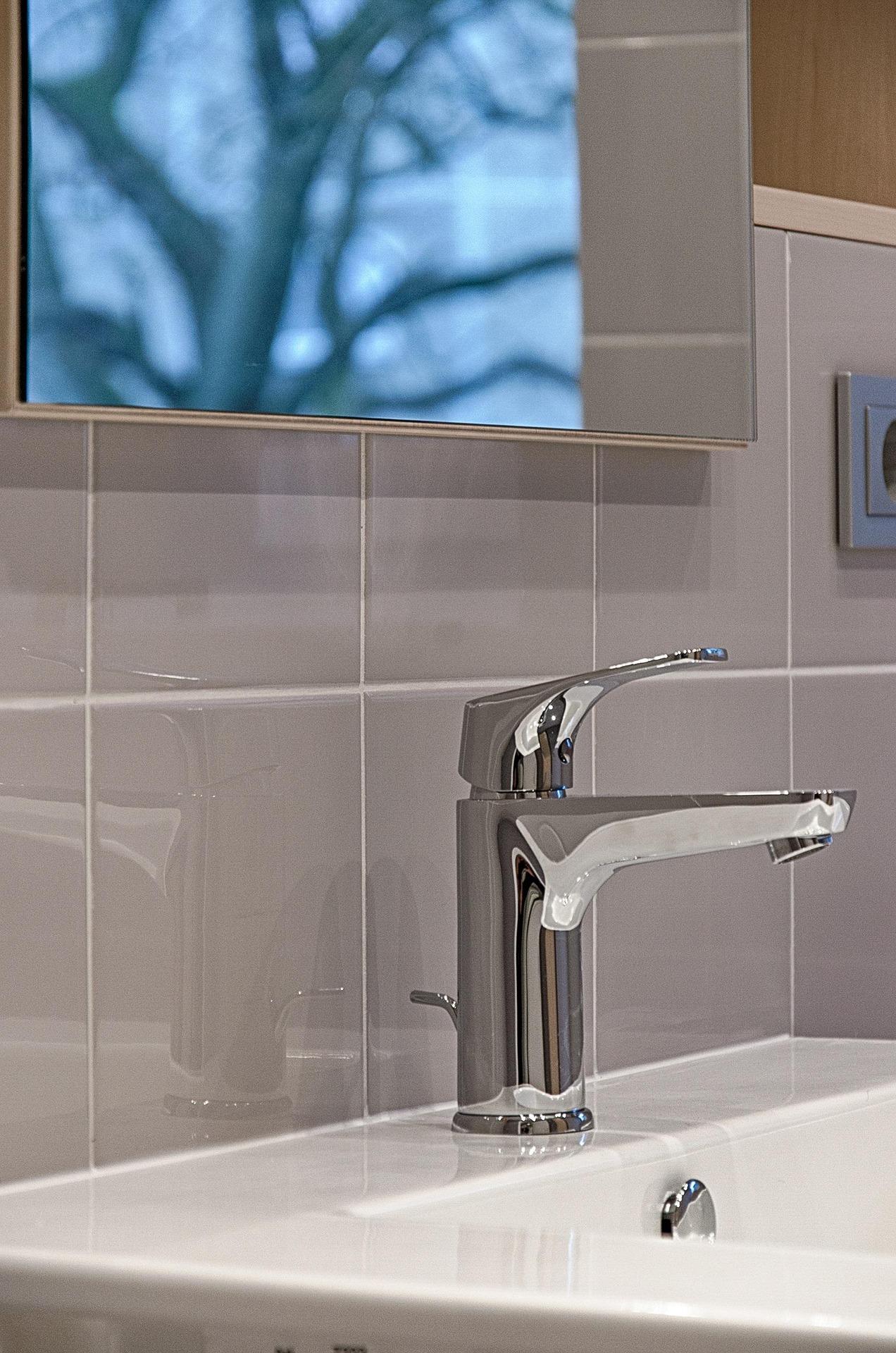 close up of sink and bathroom mirror
