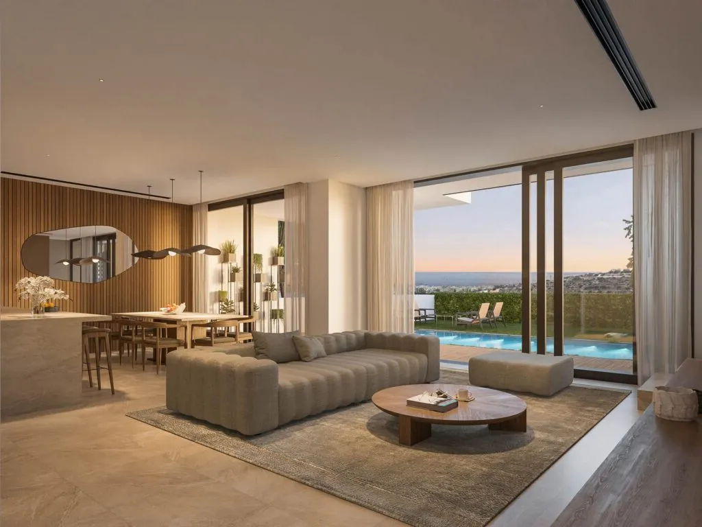 Modern living room with mint green walls and art.