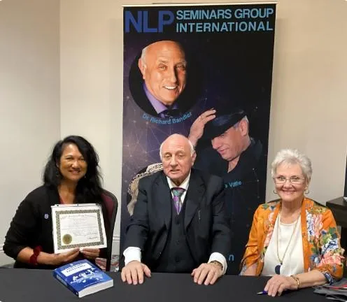 Certified NLP practitioners with Dr. Richard Bandler, empowering healthcare workers to manage stress effectively.