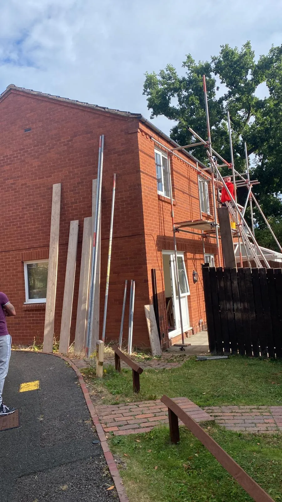 Roofer performing a roof inspection, ensuring all aspects are secure and properly maintained by JF Roofers.