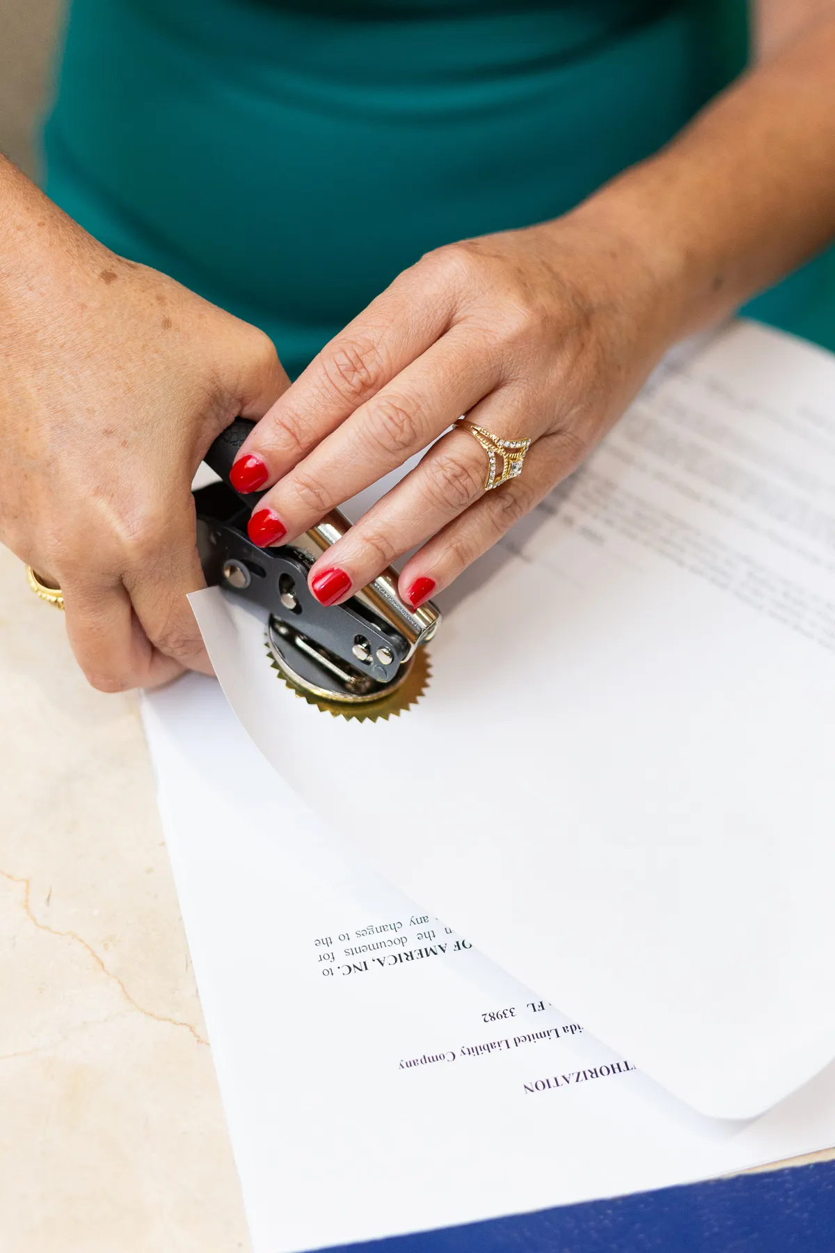 Legal professional carefully reviewing legal documentation and notarization certificates