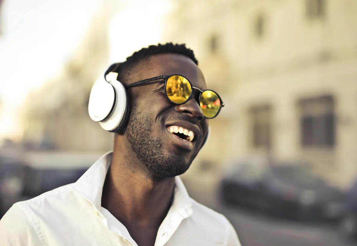 Man happily listening to music 