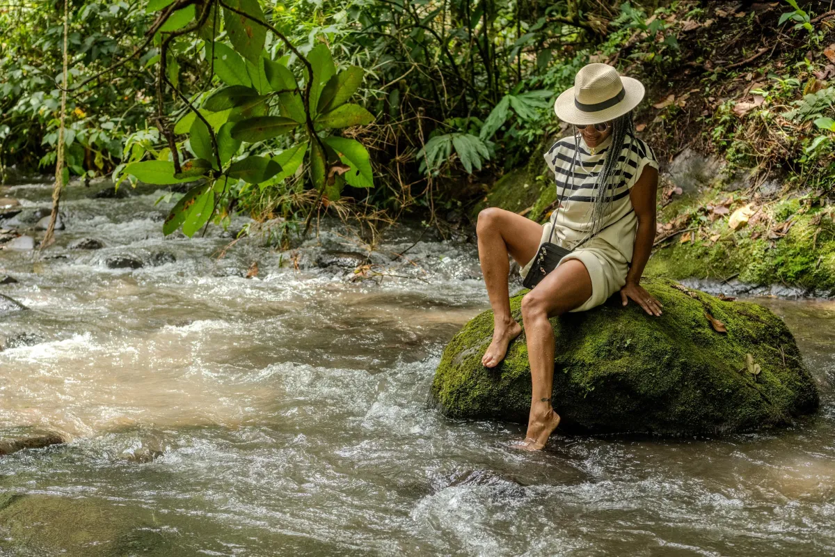 Woman relaxing by river
