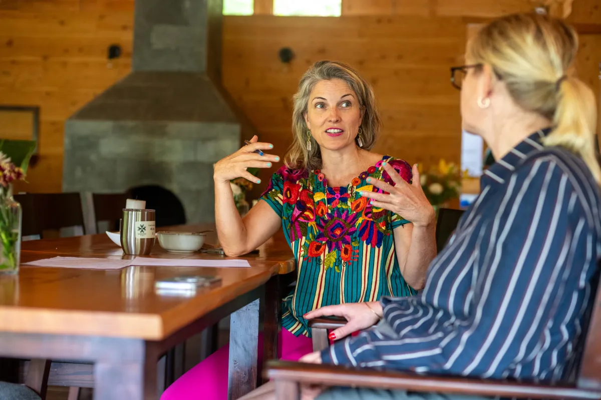 women talking together at breakfast