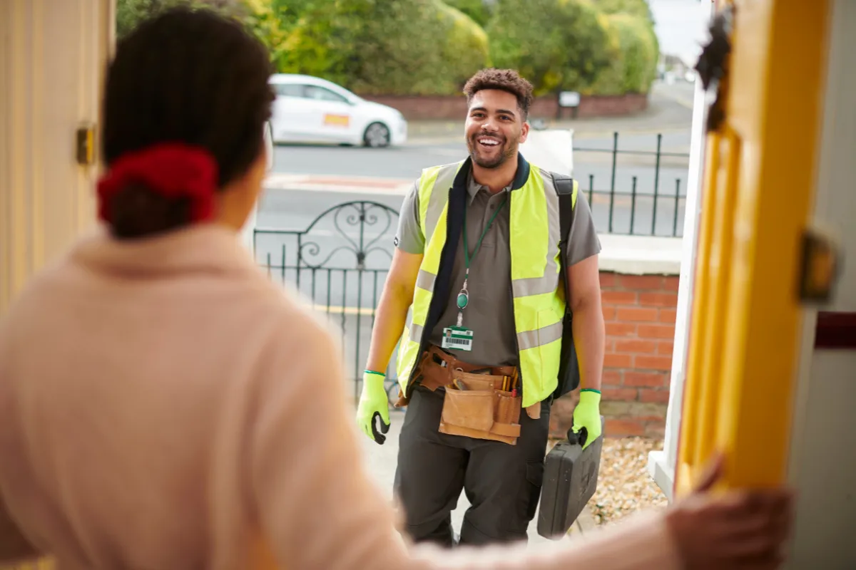 Home service professional arriving at a customer’s home