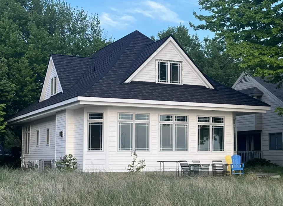modern home with newly installed asphalt shingle roofing