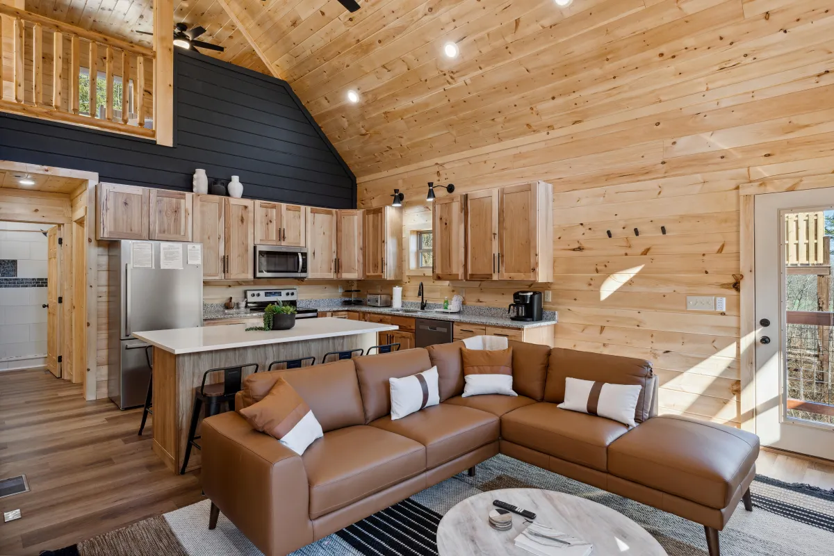 a living room with a couch and a table