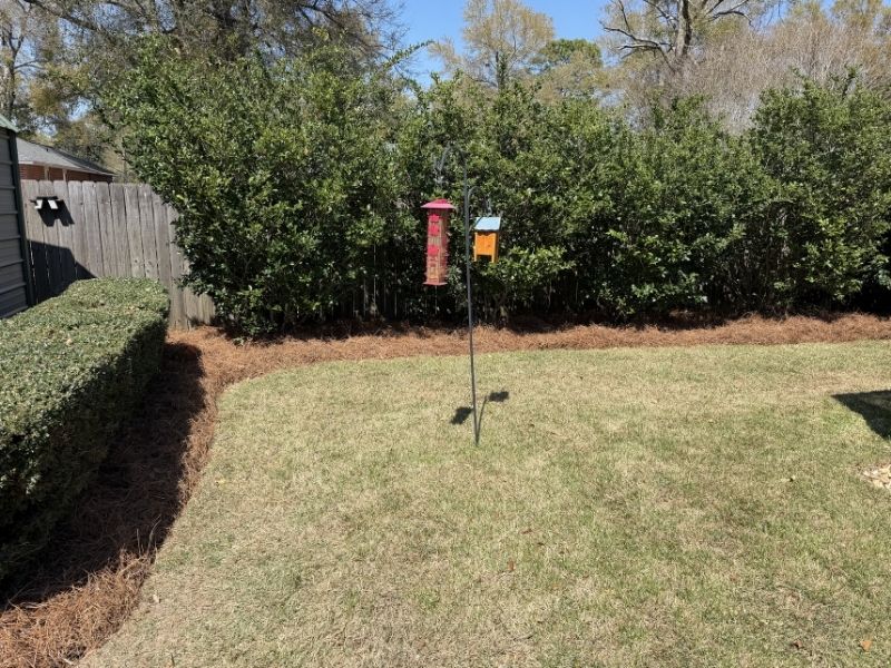 Mulch and pine straw installation services in Pensacola, FL by Green Standard Lawn and Landscape