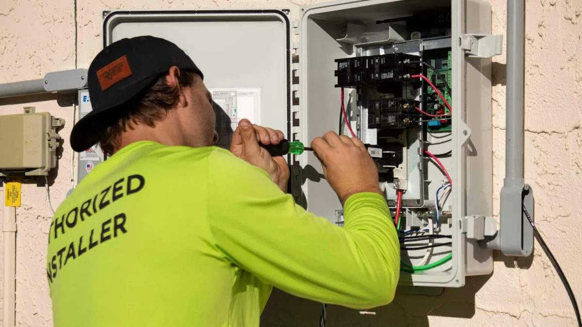 Electrician working on electrical box