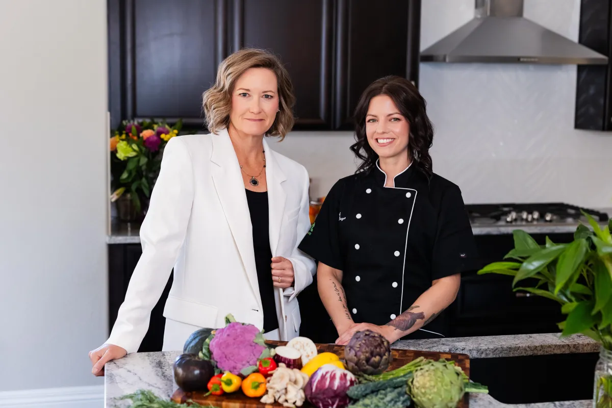 Kori and Chef Caitlin in the kitchen