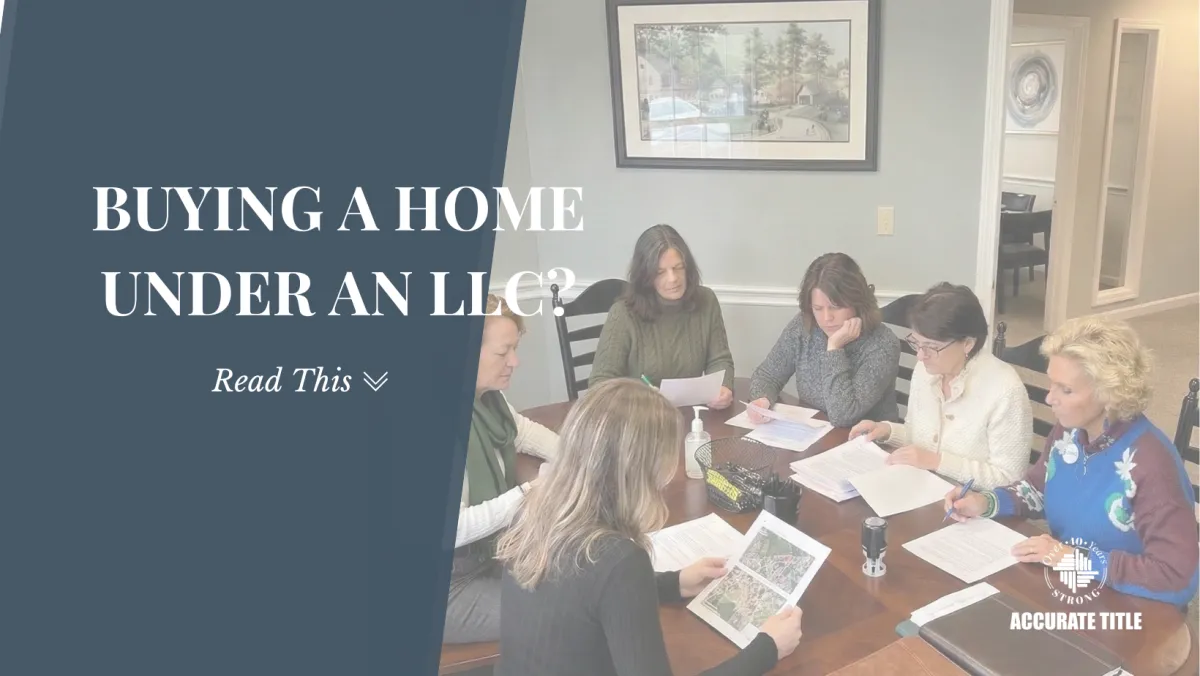 Real estate agent and buyer reviewing FinCEN compliance documents for an LLC home purchase in New Hampshire