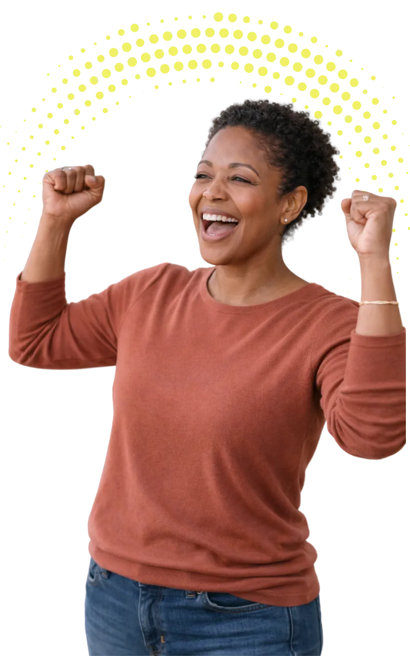 Confident woman celebrating with raised arms, symbolizing emotional healing and reclaiming identity after trauma.