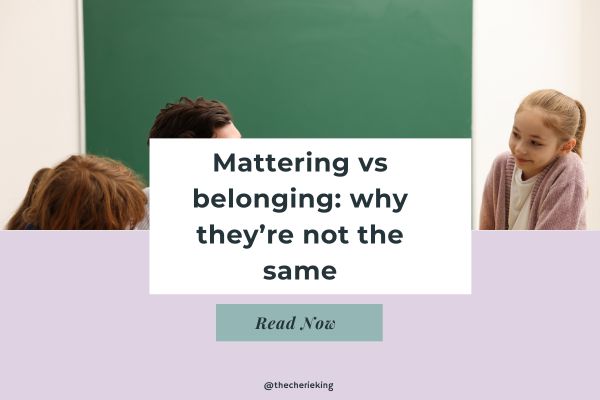 A teacher with students showing them they belong and matter