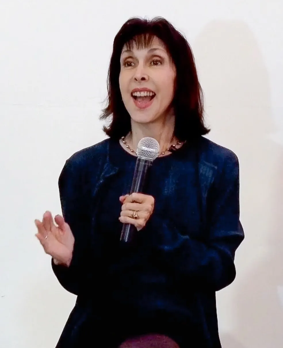 Dynamic keynote speaker addressing an executive audience from the stage