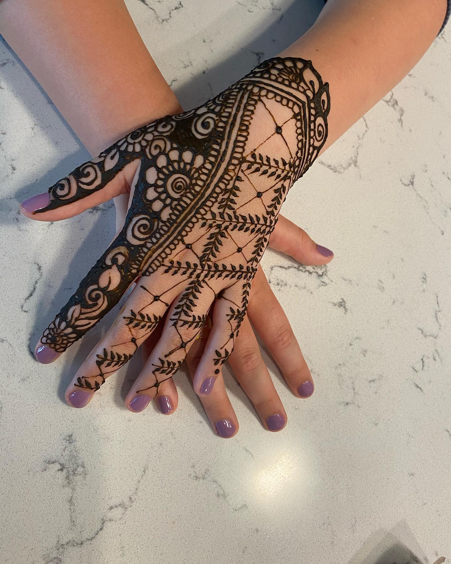 Elegant Henna designs by talented artists for upscale events.