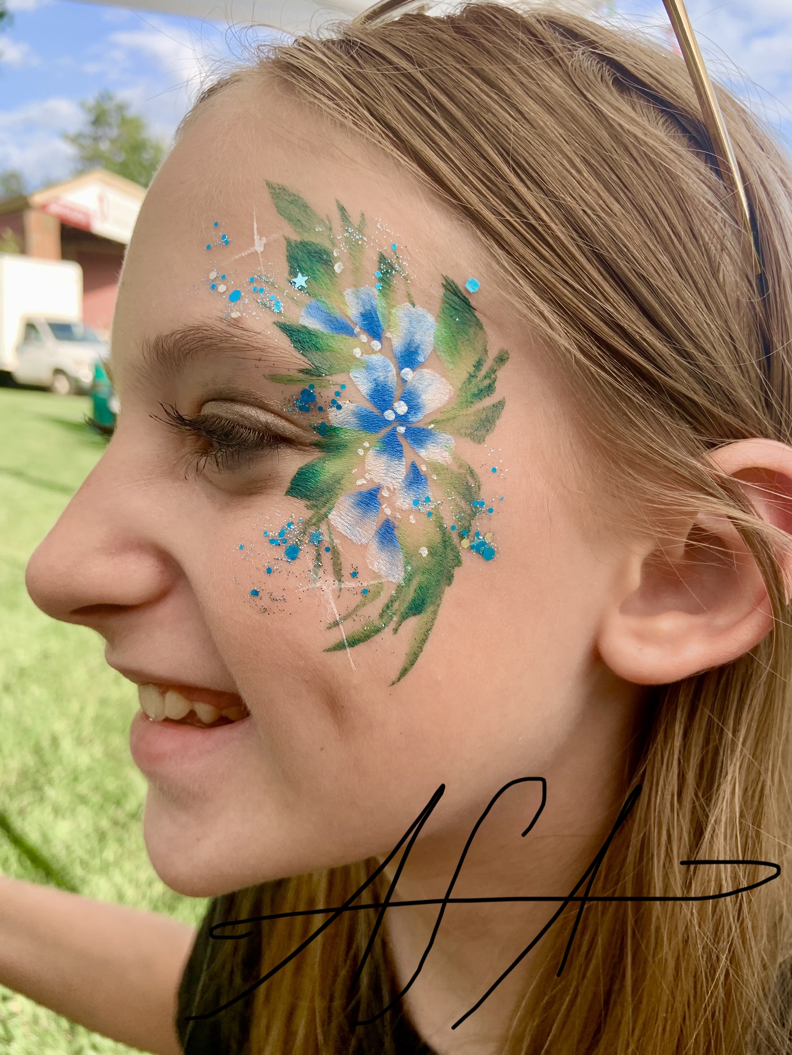 Sophisticated, detailed face paint designs for upscale events and festivals.