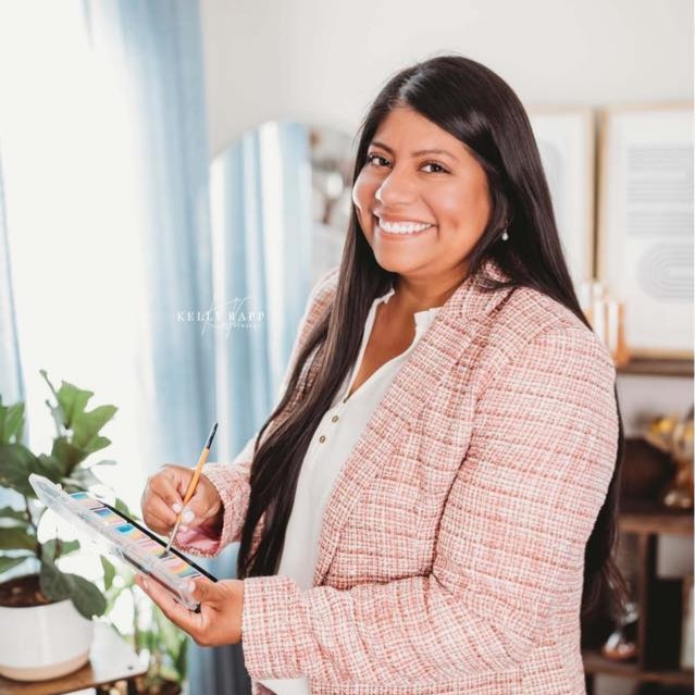 Professional face artist from the Aria Face Artistry team providing high-quality event entertainment